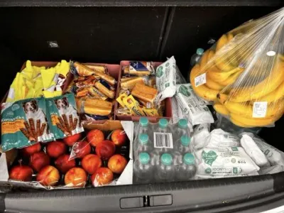Zurück aus den Ferien: Essen, Getränke und Obst verteilt — Bild 3